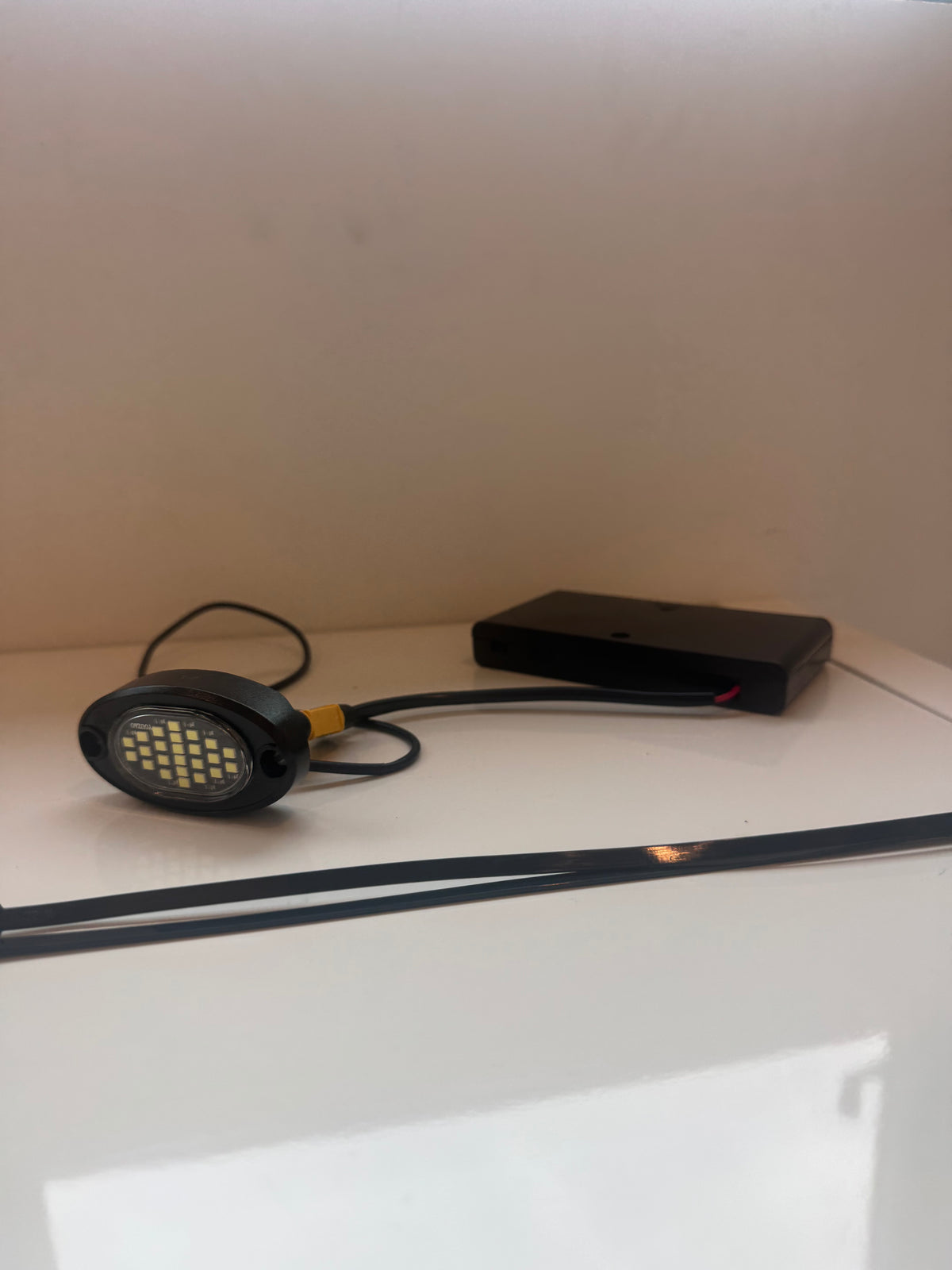 Battery powered rock light